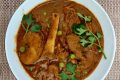 Mutton Curry With Potatoes And Green Peas